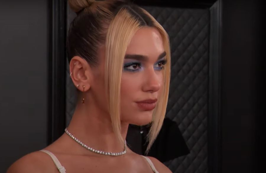 Dua Lipa skincare routine | Close up of Dua lipa at awards show