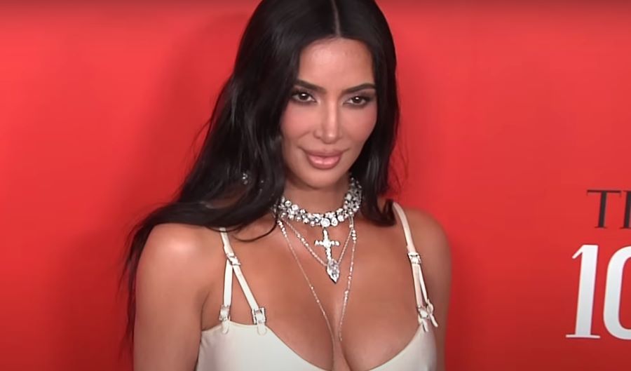 Kim Kardashian skincare routine | Kim Kardashian smiling on red carpet closeup