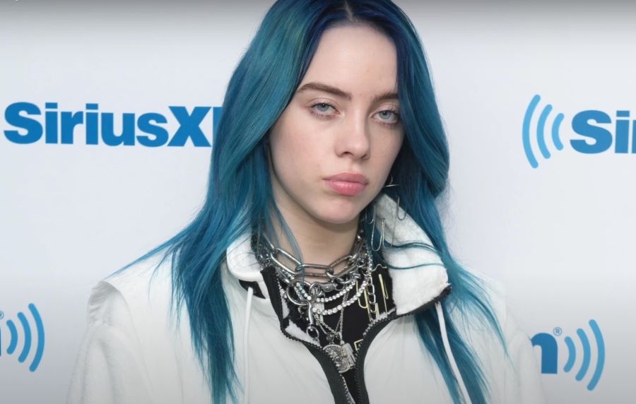 Billie Eilish Skincare Routine | close up of  billie eilish with long blue hair