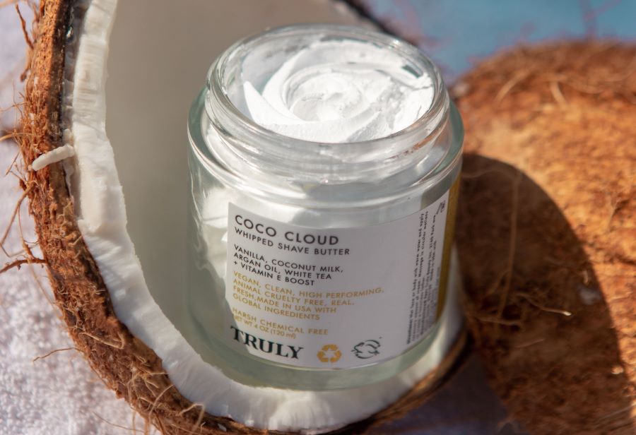 Does shaving cream expire |Truly's Coco Cloud Shave Butter without lid sat on fresh coconut