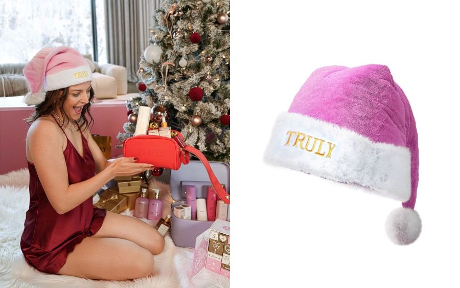 side by side image of pink santa hat and young woman wearing pink santa hat sitting in front of christmas tree holding red bag with beauty products