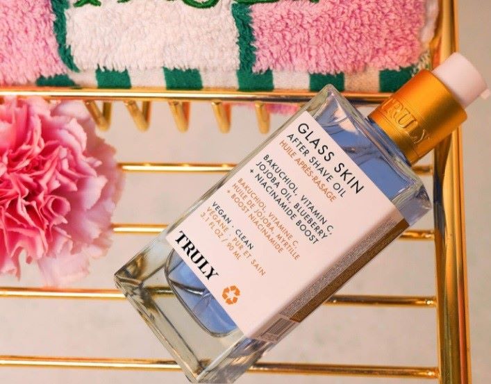 how to get rid of razor bump scars on pubic area | Truly's glass skin after shave oil with bakuchiol and vitamin C 