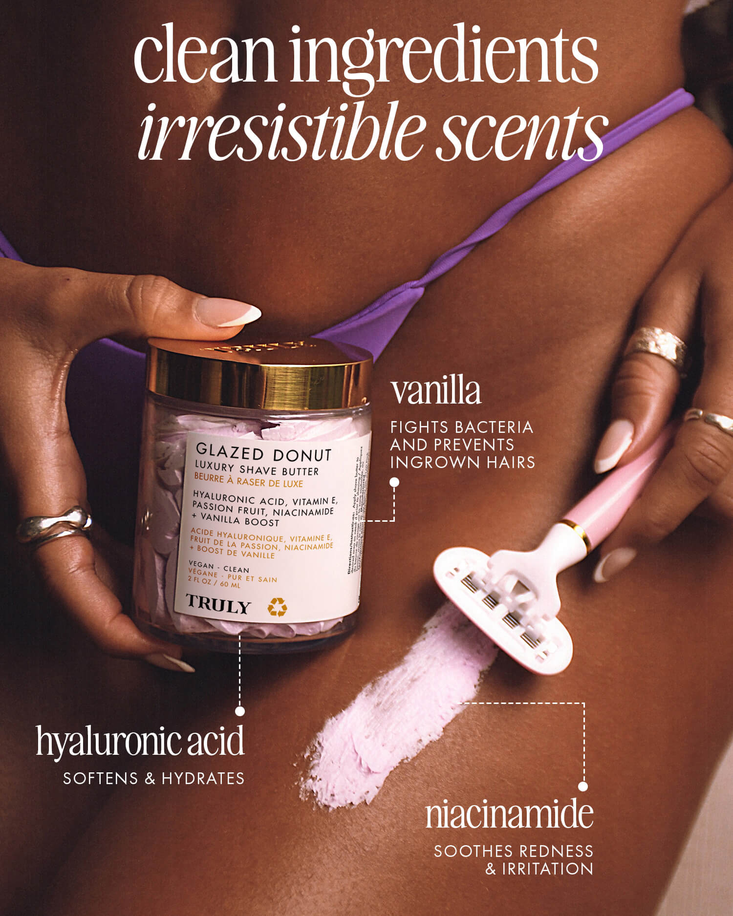 A hand applies Truly Beauty’s Glazed Donut Luxury Shave Butter to a womans thigh near her purple bikini. A labeled jar notes its hydrating formula with hyaluronic acid, vanilla, and niacinamide for smooth, nourished skin.