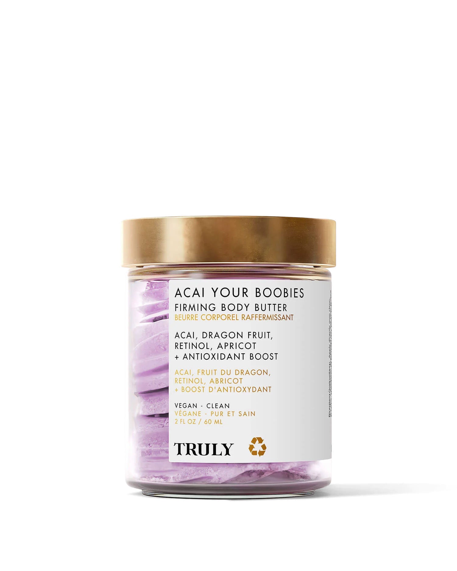 A glass jar of Truly Beauty Acai Your Boobies Butter with a gold lid, featuring acai and retinol on the label. This whipped formula has swirled purple and white hues for smoother-looking skin.