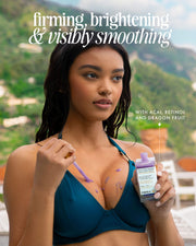 A woman in a blue bikini applies Truly Beauty’s Acai Your Boobies Firming Body Serum with acai extract and retinol to her chest, highlighting its firming, brightening, and smoothing benefits. Blurred lush greenery is in the background.