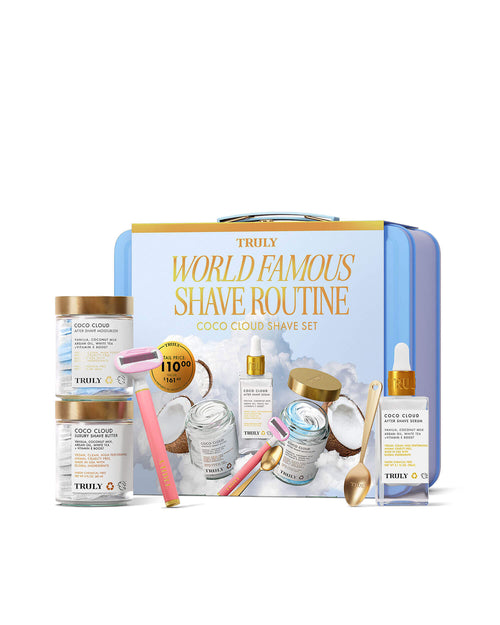 The Truly Beauty Coco Cloud Shave Set features pastel jars of shaving cream and shave butter, a pink-and-yellow 5-blade razor, a dropper bottle, spoon, and coconut-themed packaging labeled World Famous Shave Routine.