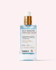 A 3.1 fl oz (90 ml) bottle of Truly Beauty's Jelly Booster Pigment Body Potion serum features blue liquid, a gold and white pump, and a label listing pomegranate extract, vitamin B12, and spirulina among its ingredients.