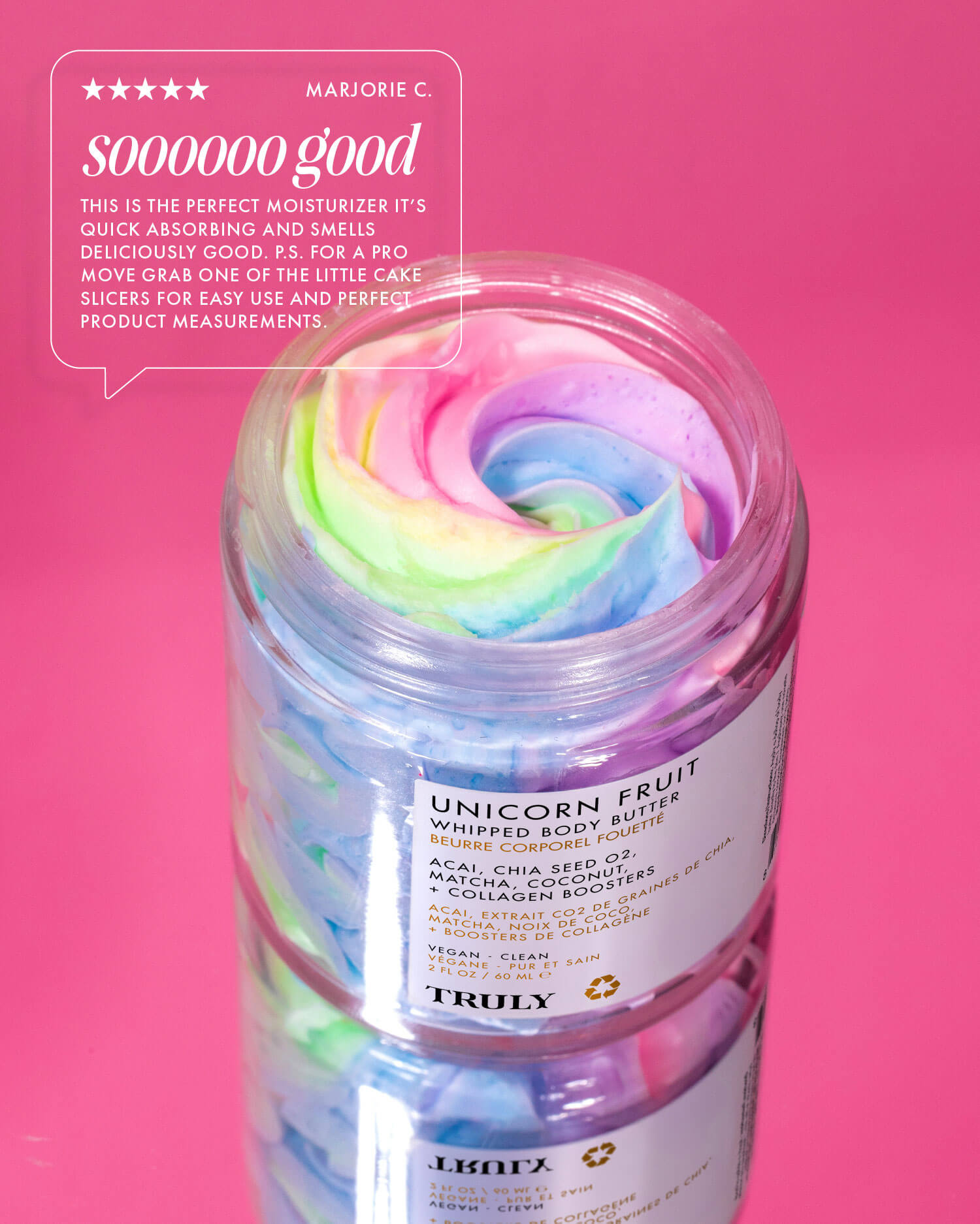 A jar of Truly Beautys Unicorn Fruit Whipped Body Butter rests on pink. A five-star review notes its dreamy scent, natural ingredients, and recommends a cake spatula to scoop the moisturizer.