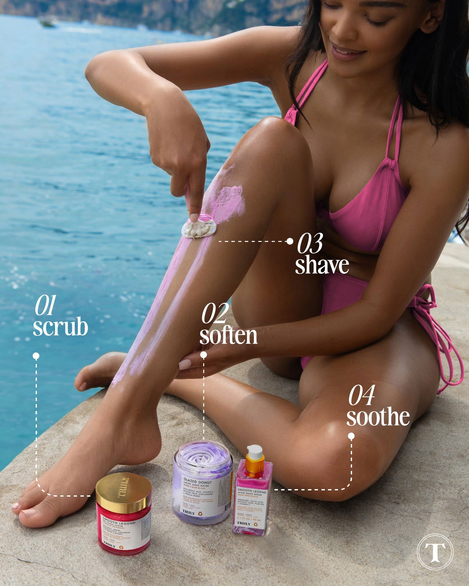 A woman in a pink bikini shaves her leg by the water, surrounded by Truly Beautys Smooth Legend Shave Routine products—steps: 01 exfoliate, 02 soften, 03 shave, and 04 soothe—showcasing a four-step path to smooth skin.