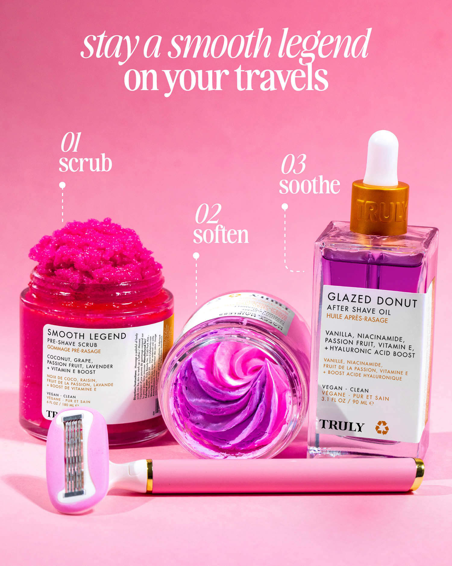 A pink-themed display featuring Truly’s Glazed Donut After Shave Oil, a bright pink scrub, facial roller, and razor—your essentials for smooth, hydrated skin after shaving, styled on a vibrant pink background.