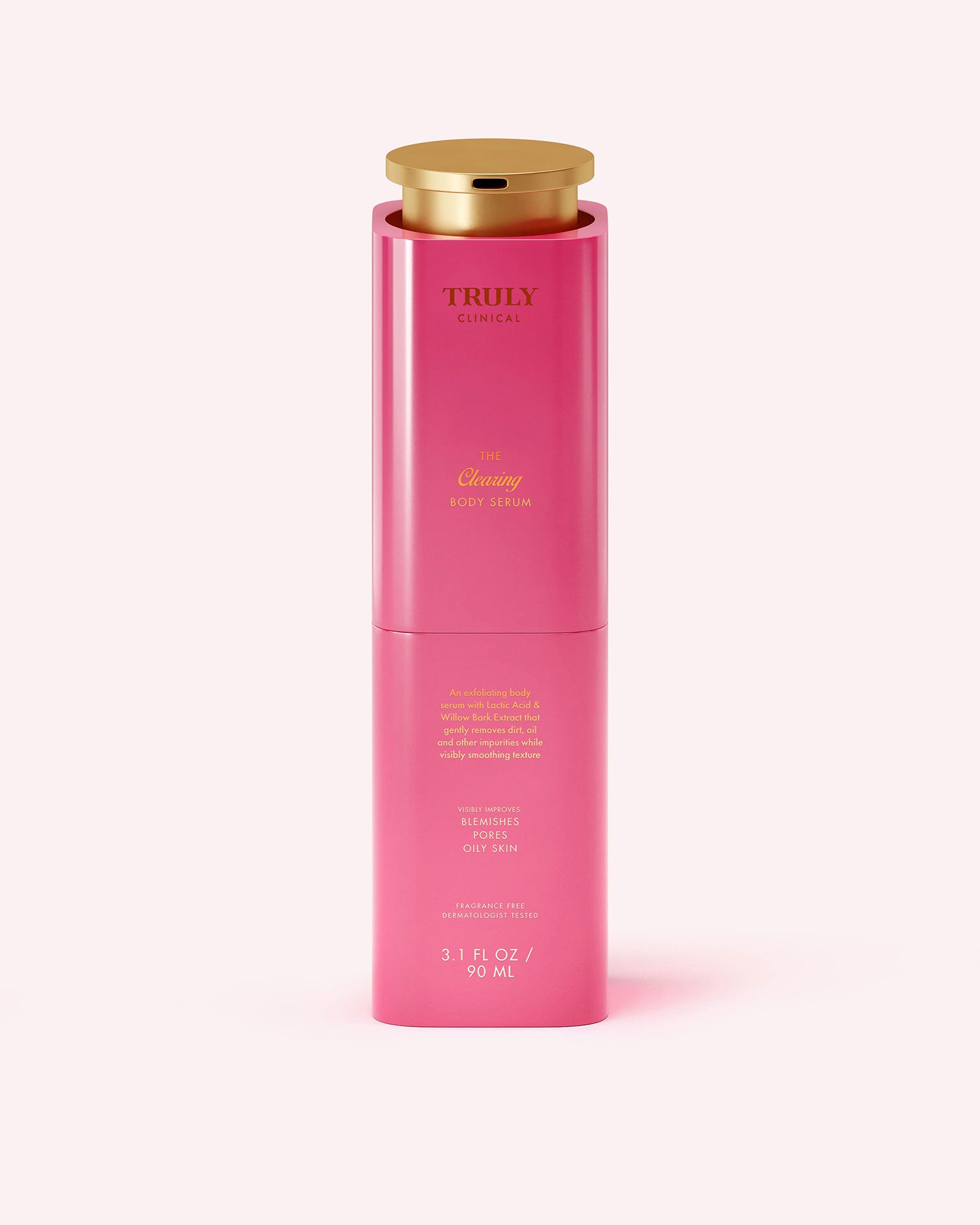 A bright pink cylindrical bottle with a gold cap, labeled Truly Beauty The Clearing Body Serum, 3.1 fl oz (90 mL), stands upright against a light pink background.