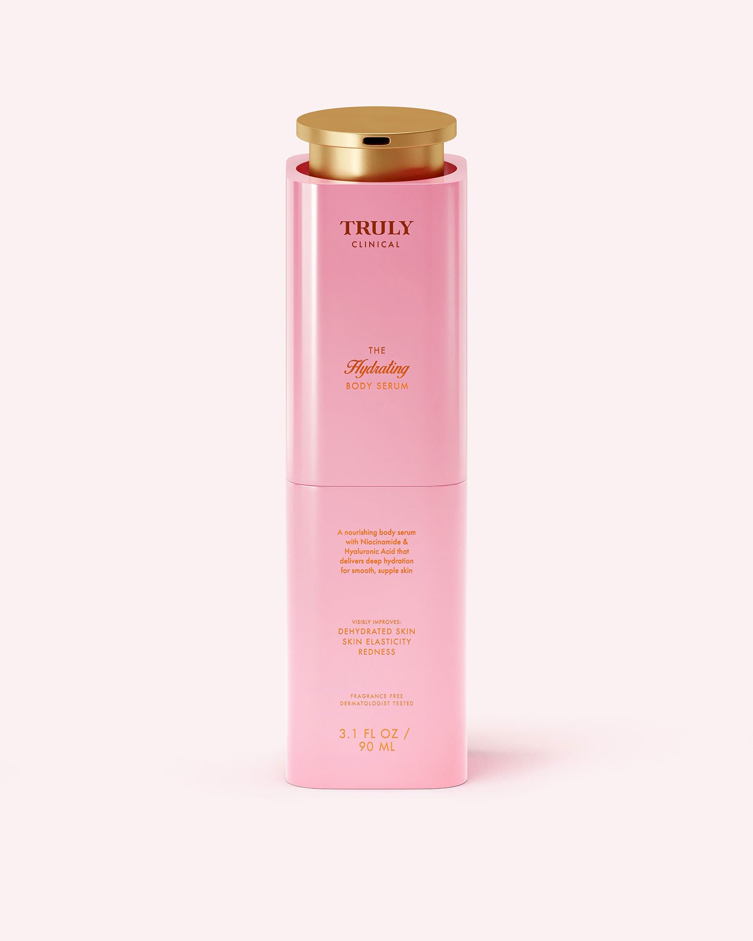 A pink cylindrical bottle with a gold cap labeled Truly Beauty The Hydrating Body Serum stands upright on a plain background. This 3.1 FL OZ (90 mL) serum is infused with hyaluronic acid for intense hydration.