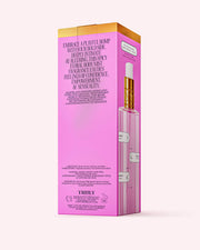 A pink and gold rectangular box displays Truly Beautys Birthday Sex Perfume Mist, described as an intimate, spicy floral with jasmine notes. The packaging includes an image of the clear bottle with a white dropper cap.