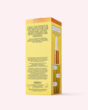 A yellow and white box of Cooka Oil by Truly Beauty is shown, featuring product info, directions, ingredients, an image of the dropper bottle, and benefits for soothing pubic hair and treating ingrown hairs.