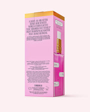 A pink and gold box for Truly Beautys Unicorn Fruit After Shave Serum, showing a pump bottle and text about soothing redness, fighting ingrowns, and fast absorption. Directions and ingredients are also visible.