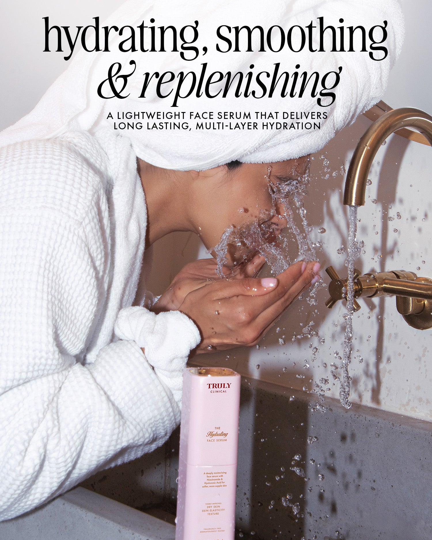 A person in a white bathrobe splashes water on their face by a sink with a gold faucet. On the counter is Truly Beauty’s The Face Serum Duo, known for its hydrating, smoothing, and replenishing effects.