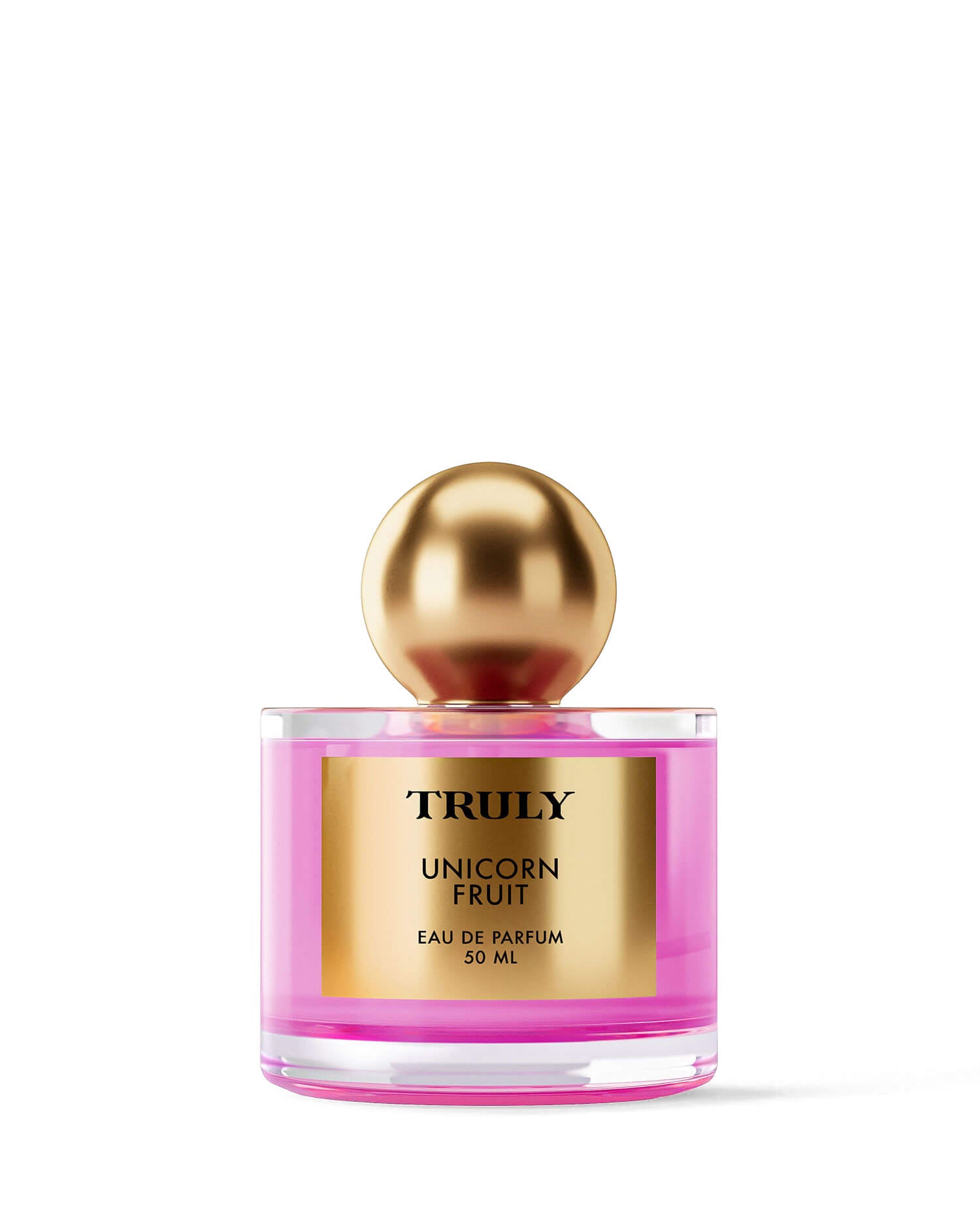 A clear glass bottle of Truly Beauty’s Unicorn Fruit Eau De Parfum (50mL), with a shiny gold cap, stands on a light pink background, highlighting its sweet, fruity scent that pairs perfectly with the Unicorn Fruit Body Butter.