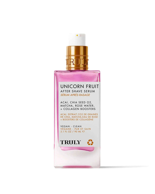 A 3.1 fl oz (90 ml) pink bottle of Truly Beauty’s Unicorn Fruit After Shave Serum with a gold pump, featuring collagen boosters, acai, chia seed oil, matcha, and rose water. Vegan and clean formula helps soothe skin and prevent ingrowns.