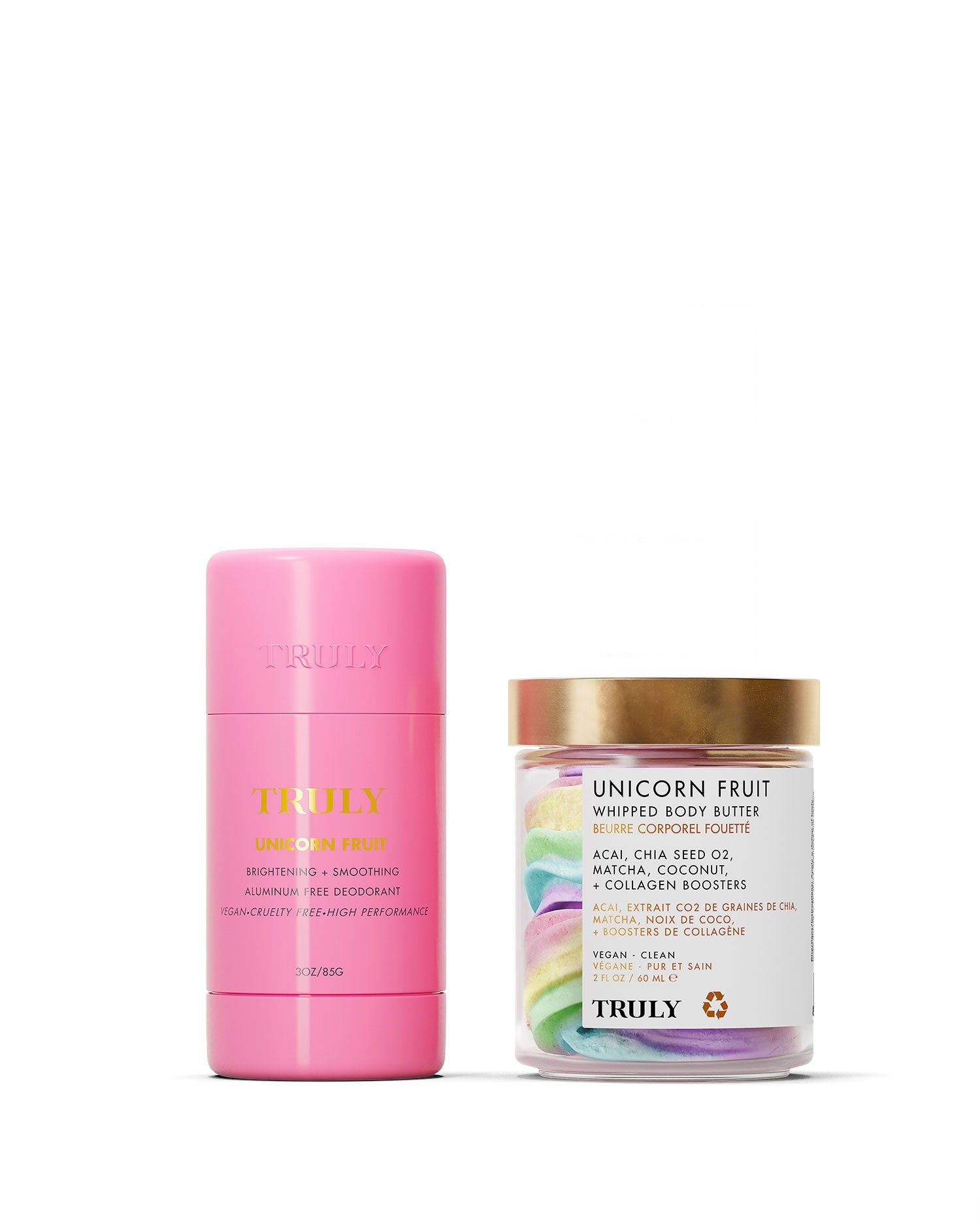 The Truly Beauty Unicorn Fruit Duo includes a pink cylindrical brightening deodorant with a cotton candy scent and a jar of pastel whipped body butter made with natural ingredients, both displayed on a pale pink background.