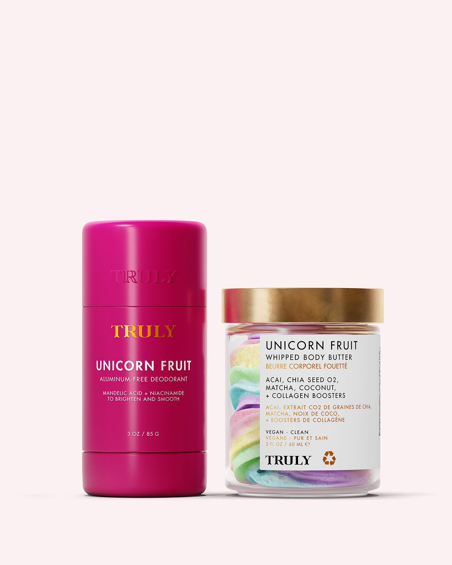 The Truly Beauty Unicorn Fruit Duo, featuring a deodorant stick and colorful whipped body butter, is displayed side by side on a light pink background.