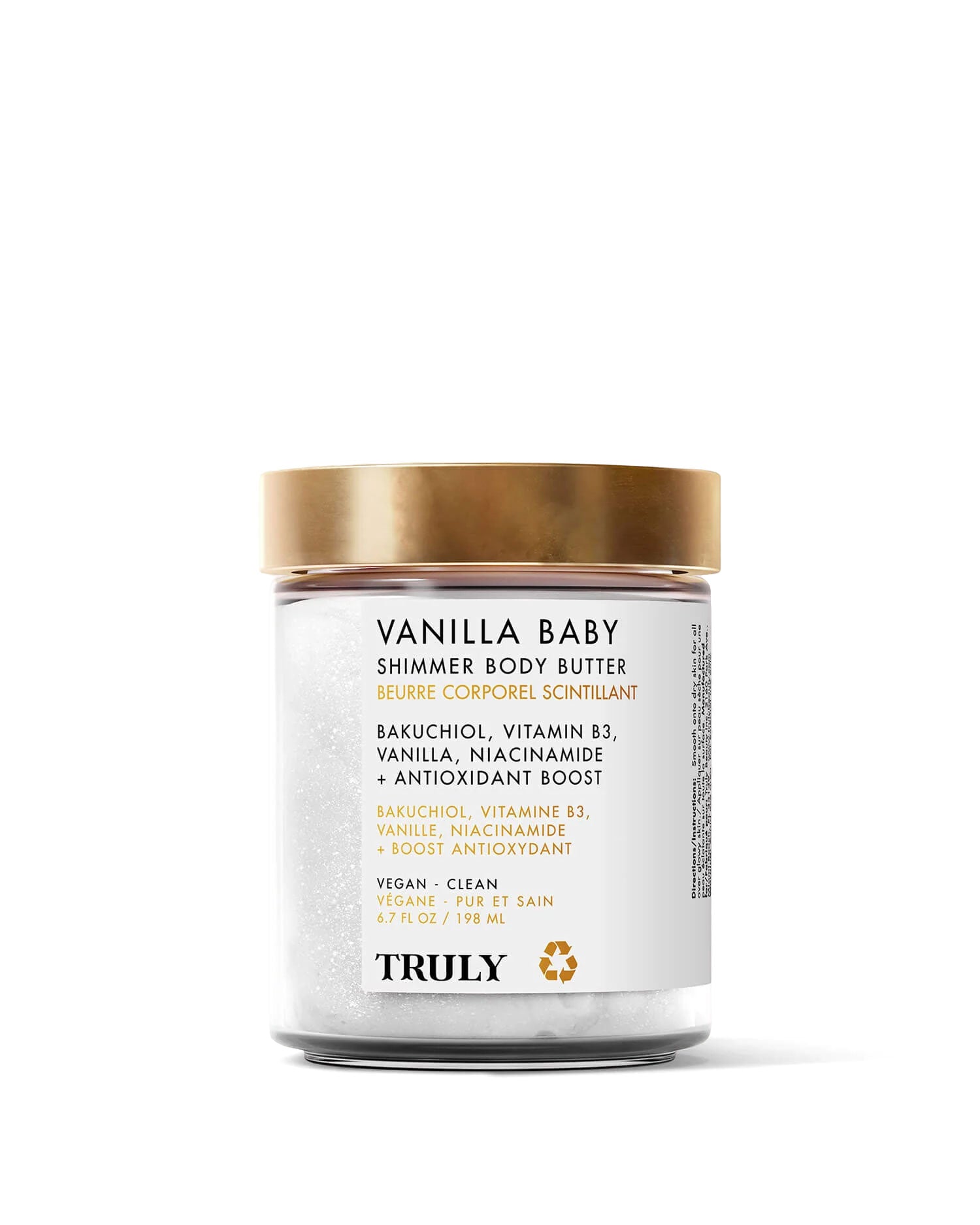 Truly Beauty’s Vanilla Baby Shimmer Body Butter comes in a glass jar with a gold lid and white label, highlighting bakuchiol, niacinamide, and vanilla. This creamy formula provides a Smoothing Shimmer for subtle radiance.