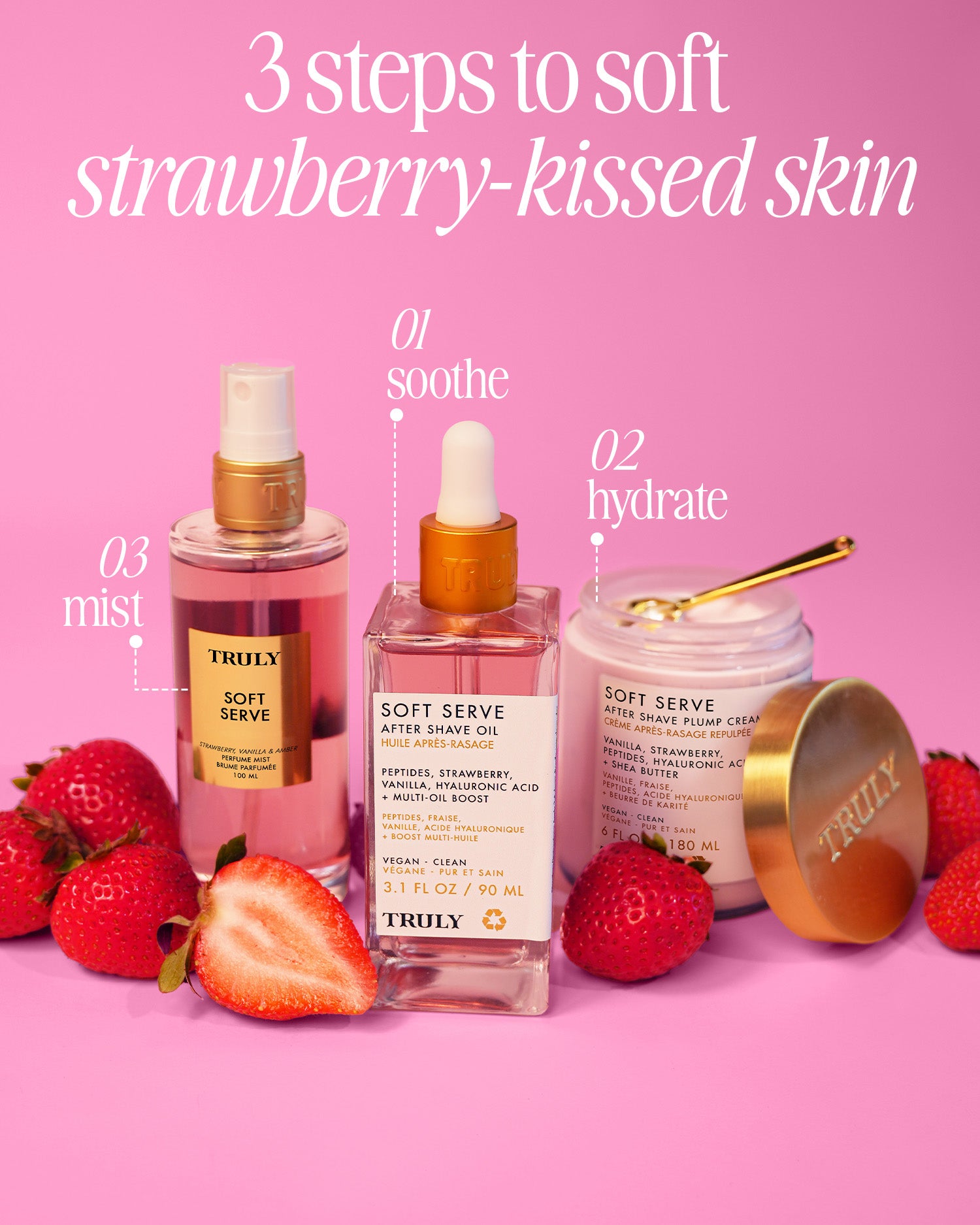 The Truly Beauty Soft Serve Luxury Trio is arranged with fresh strawberries on a pink background. Text reads, “3 steps to soft strawberry-kissed skin: soothe, hydrate, mist.”.